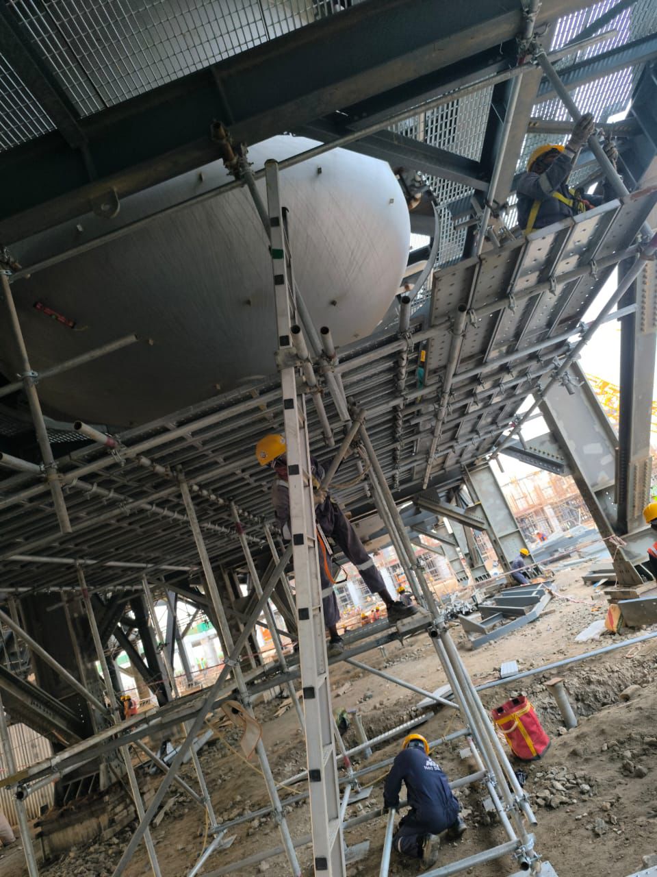 Scaffolding pipes and materials at construction site