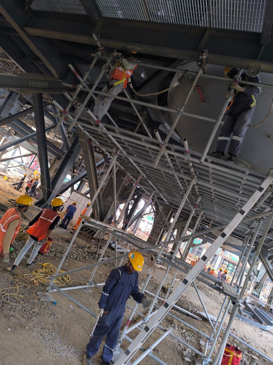 Blue scaffolding structure for building construction