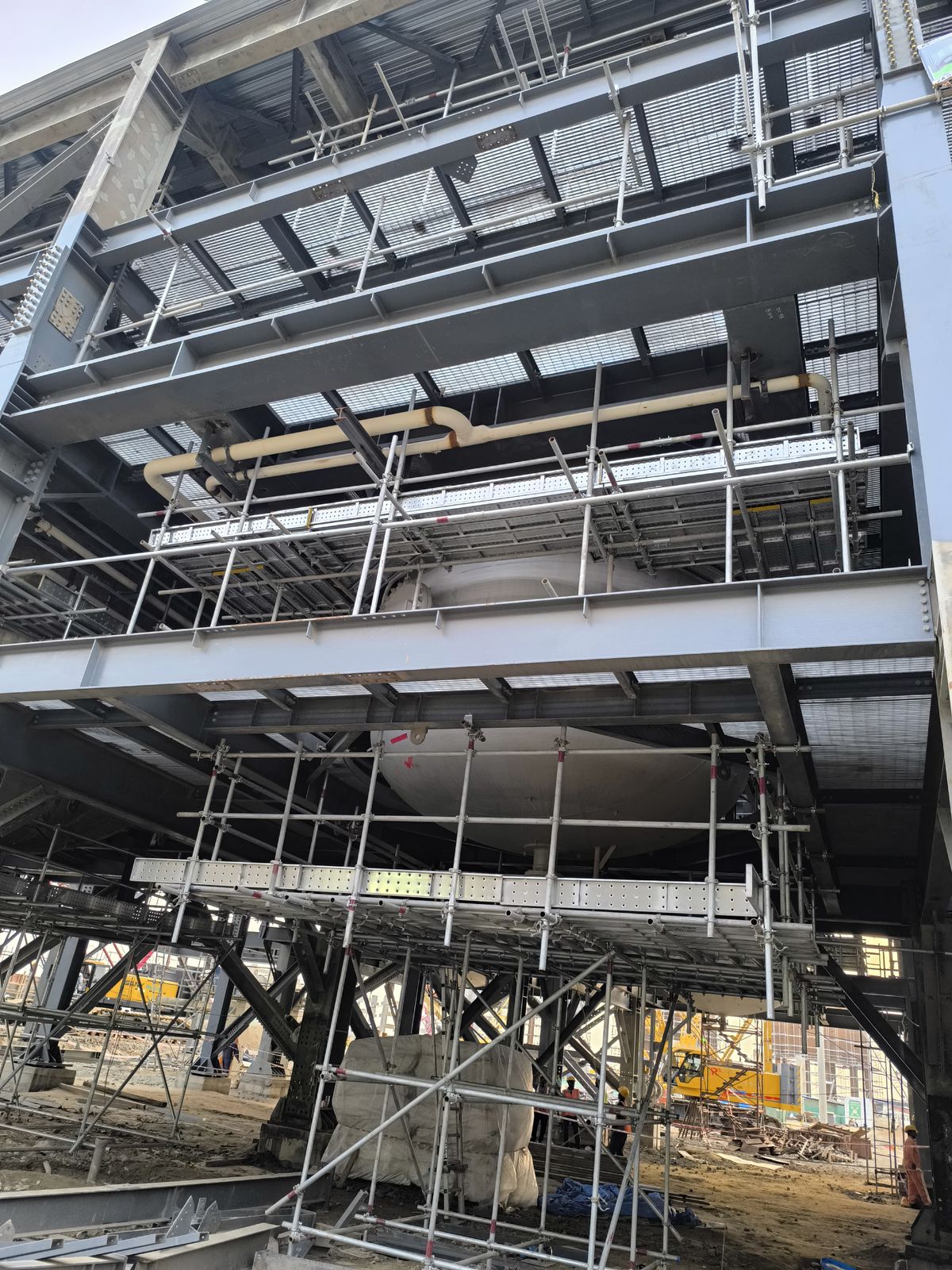 Stacked scaffolding boards and planks