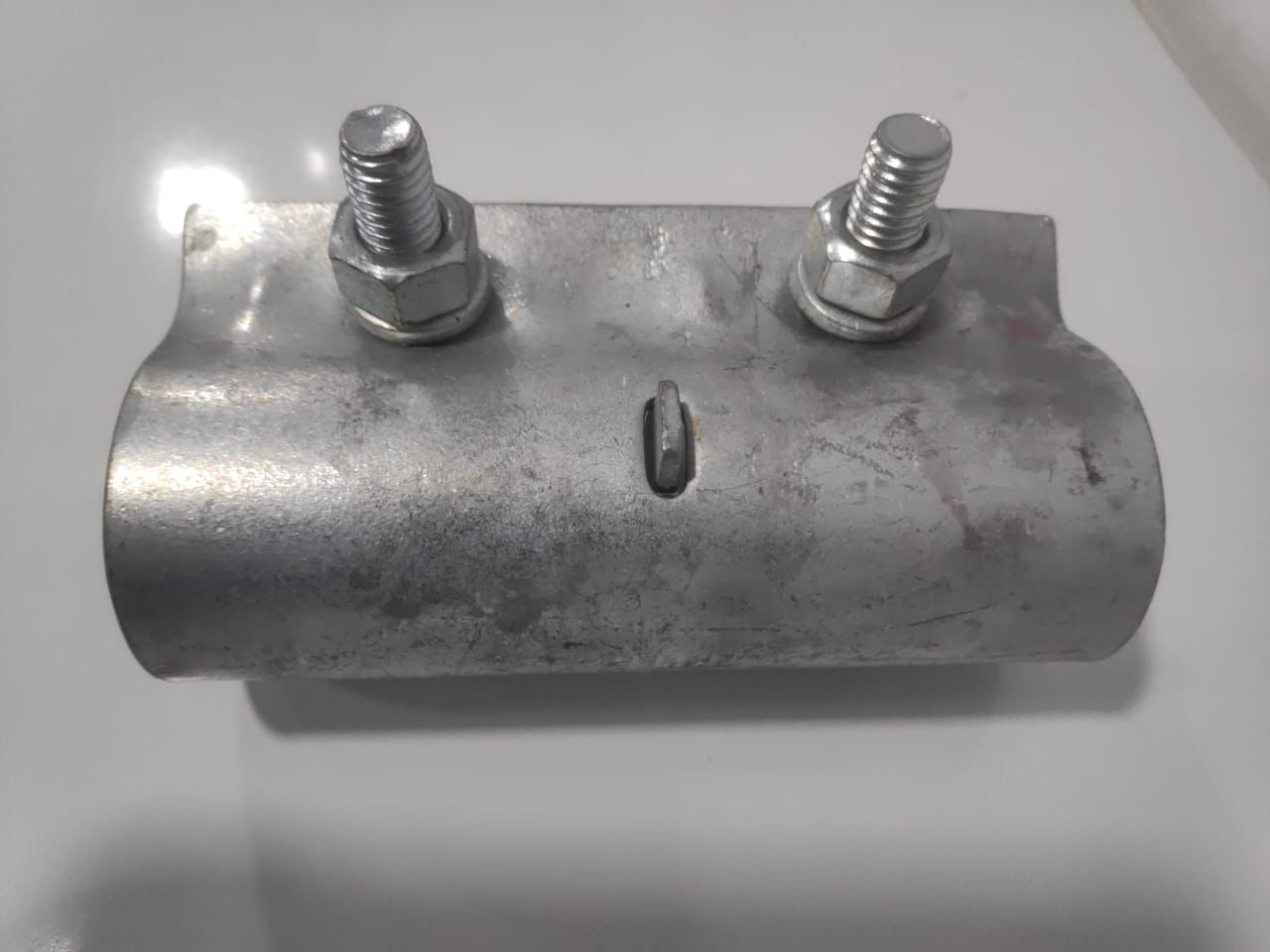 Workers assembling scaffolding pipes for rental project, Mundra, Gujarat