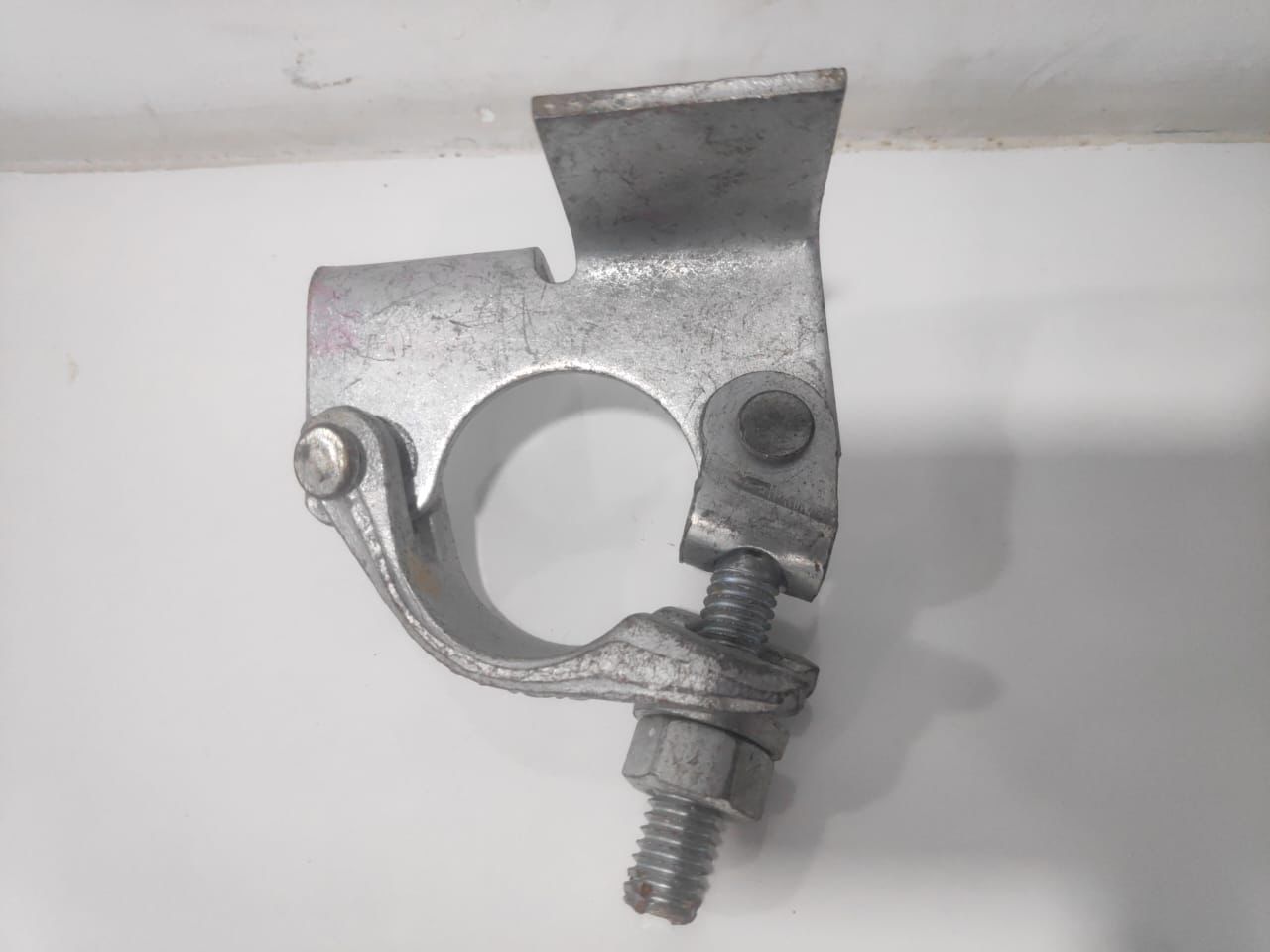 Multi-story building under construction with scaffolding rental service in Mundra, Gujarat